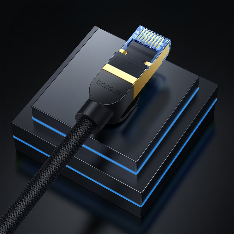 A close-up of a BOE3LITE Ethernet cable connector with a gold-plated RJ45 plug and braided black cable, resting on a black tiered display stand with blue LED lighting.