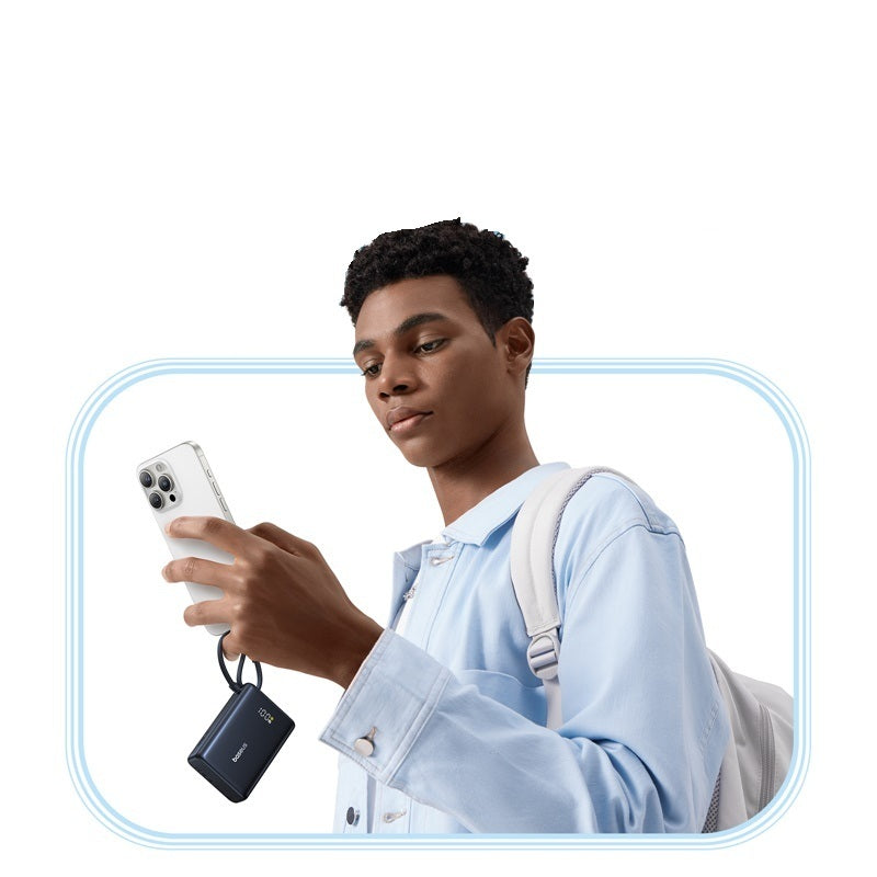 Person holding a smartphone with a white background