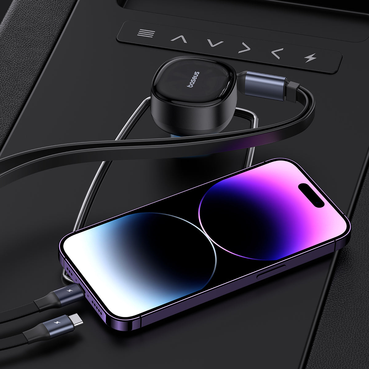 Phone with charging cable and wireless charger on a dark surface