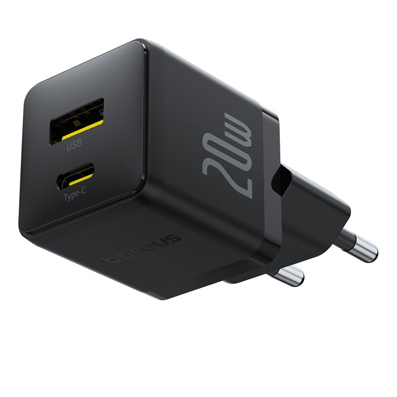 Black power adapter with USB and Type-C ports on a white background