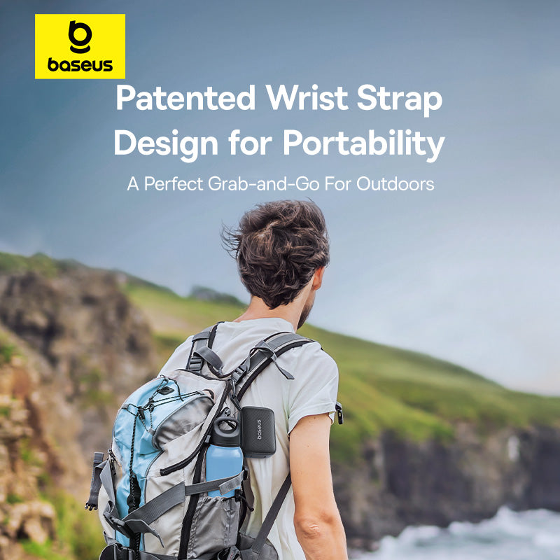 Person with a backpack featuring a patented wrist strap design, set against a scenic outdoor background.