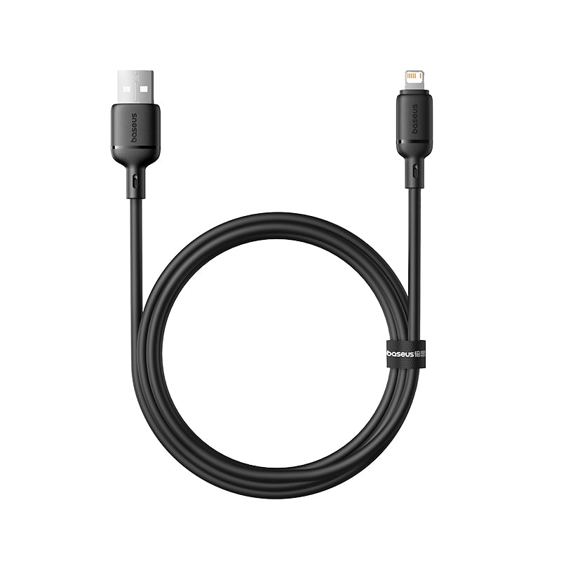 A black USB-C to Lightning data and charging cable coiled in a loop, shown on a solid white background. The brand name 'DOGBITS' is visible on both connector housings and the cable tie.