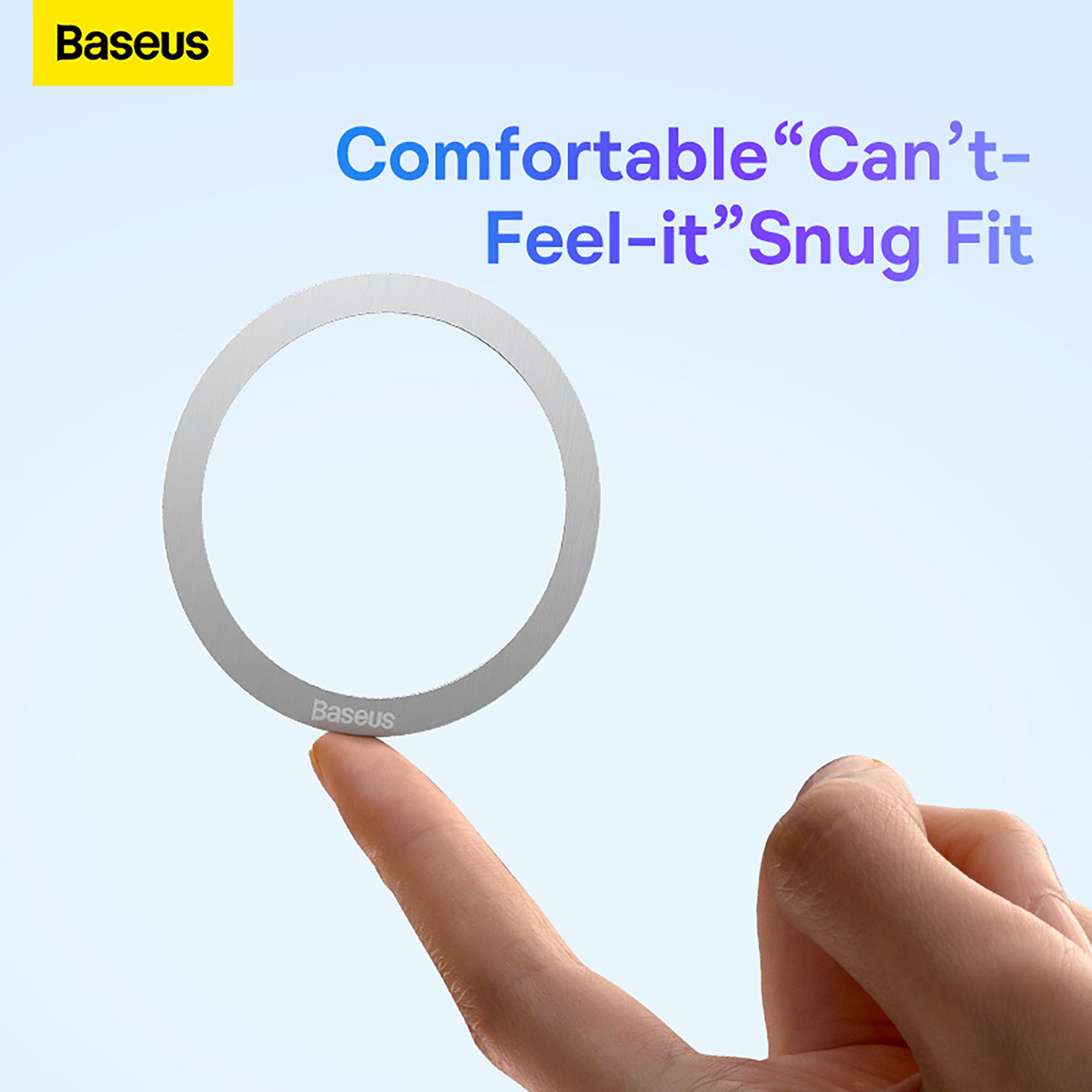 Hand holding a circular metal gasket with Baseus branding against a light blue background