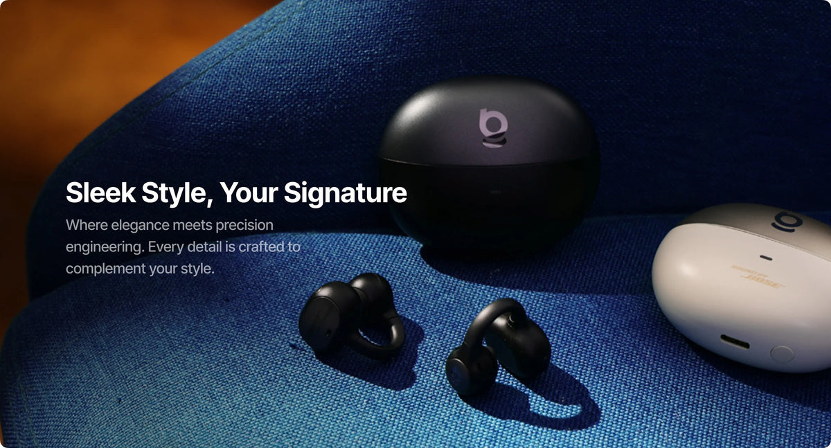 Black wireless earbuds with charging case on a blue fabric background, featuring text about sleek style and signature design.