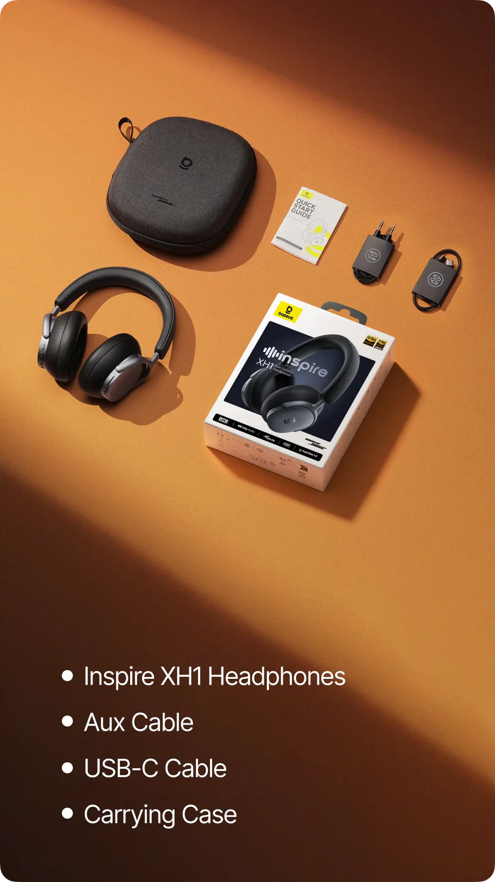 Set of Inspire XH1 Headphones with accessories on a brown surface