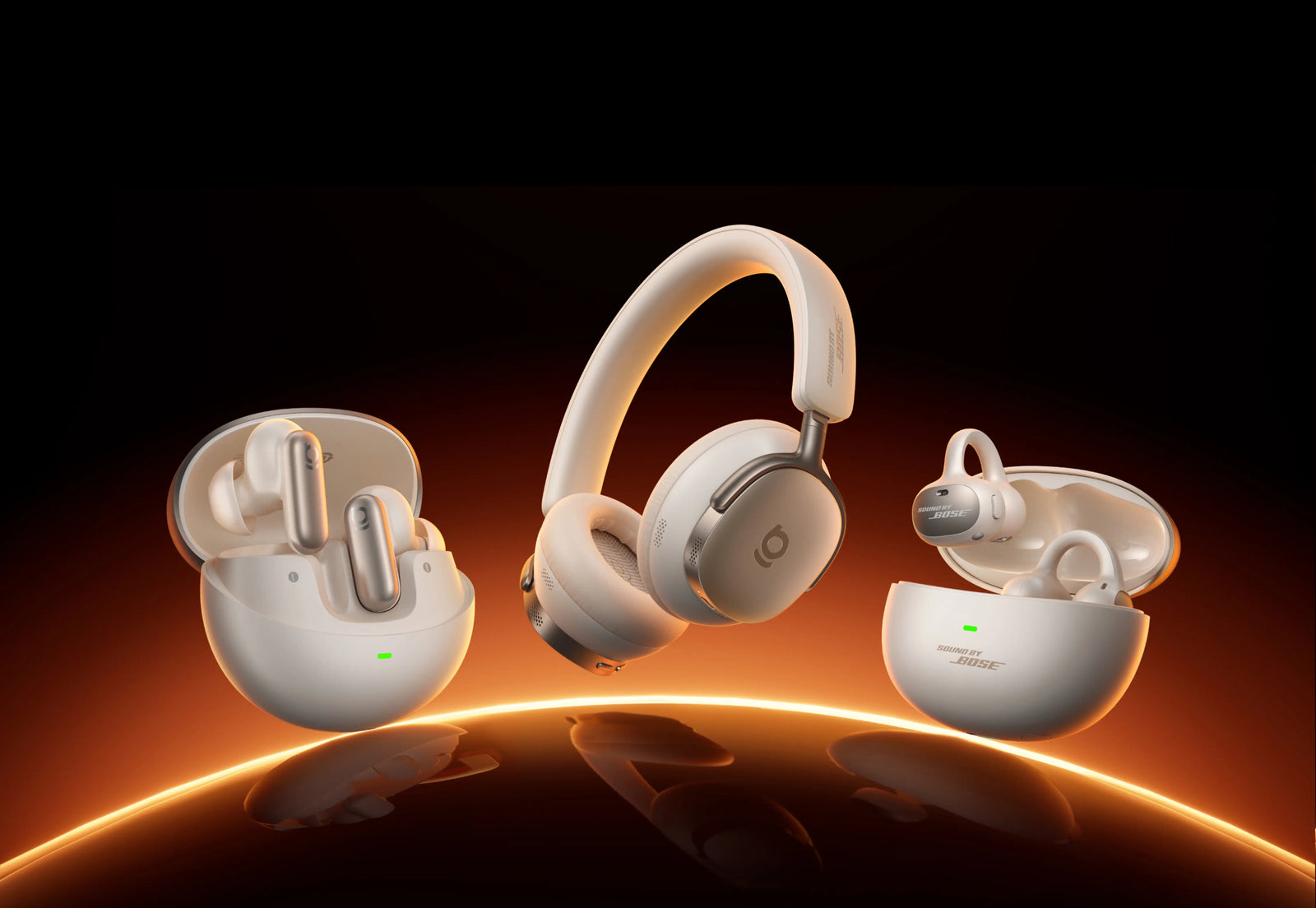 Wireless earbuds and headphones with charging case on a reflective surface with a dark background